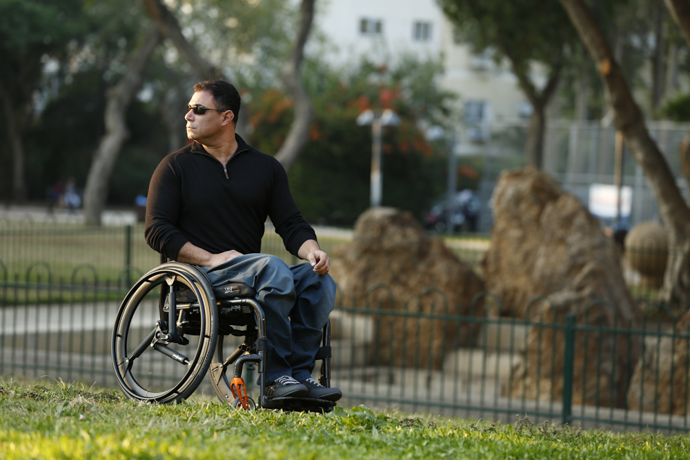 Man with wheelchair and SoftWheel wheels